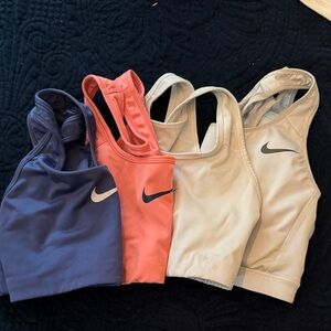 Nike Sports Bra Trio in Navy, Coral, and Beige